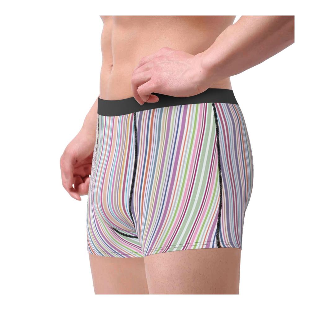 Erleben Sie maximalen Komfort mit unseren Herren-Boxershorts im Leopardenmuster-Druck. Der bedeckte Bund und feuchtigkeitsableitende Stretch-Stoff machen sie unwiderstehlich